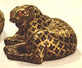 Bronze adornment in leopard shape, gold and stone inlays, Han